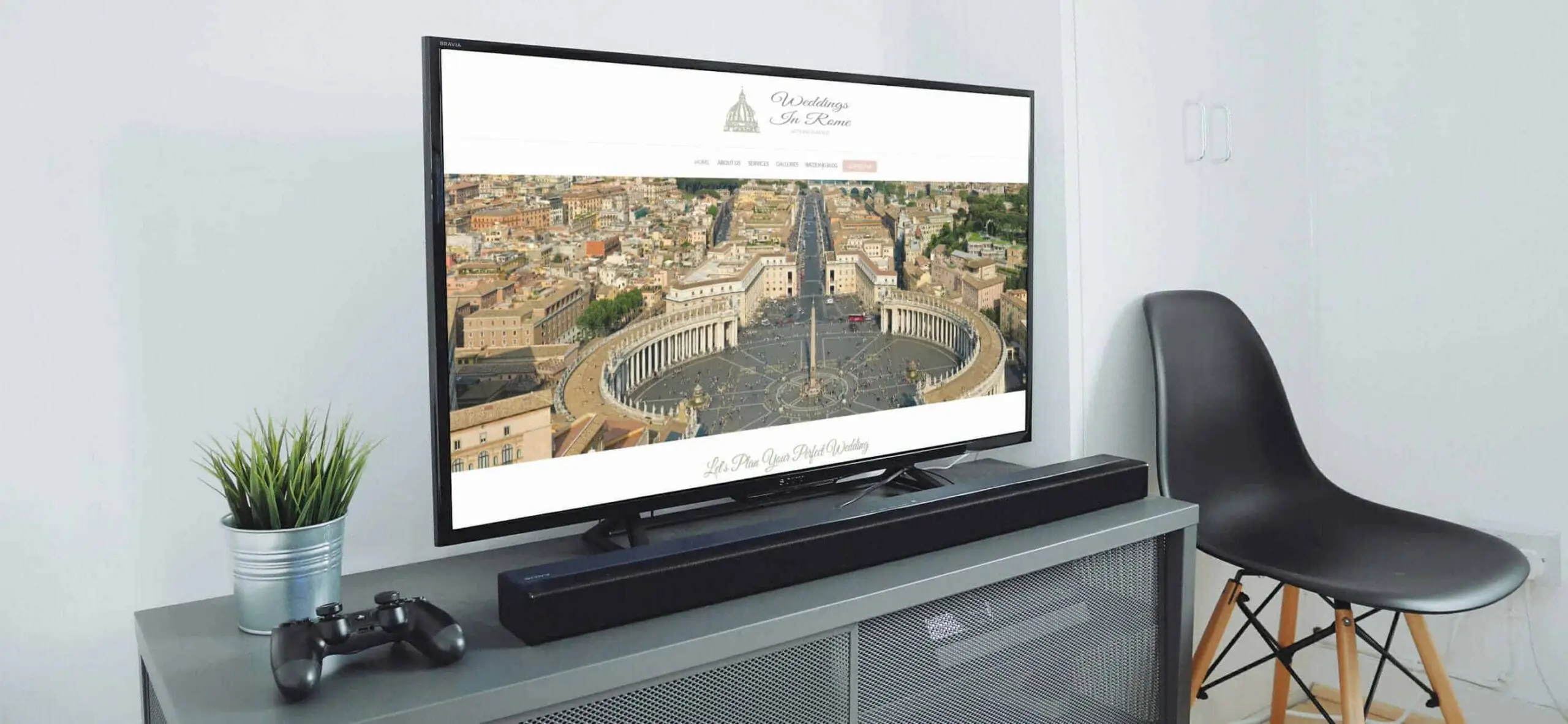 The Weddings in Rome homepage on a large screen in a living room